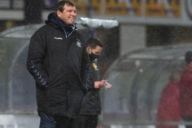 Tommy Wright at a wet Dens Park - his Kilmarnock side trail 2-1 after first leg of Premiership play-off final  (Photo by Craig Foy / SNS Group)