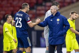 Andy Considine is congratulated by Steve Clarke on another fine performance for his country