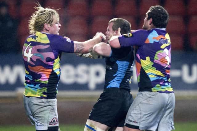 Tempers fray between Edinburgh's Scott MacLeod (left) and Glasgow's Chris Fusaro in the 1872 Cup in December 2010. (Picture: Craig Watson/SNS)