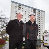 From left: Fraser and Andrew Renwick onsite with the Tulloch Court flats behind. Picture: ASM Media & PR.