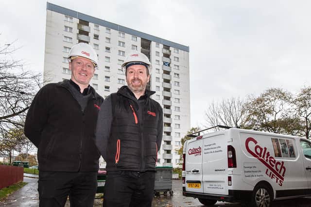 From left: Fraser and Andrew Renwick onsite with the Tulloch Court flats behind. Picture: ASM Media & PR.