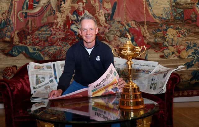 Winning Ryder Cup captain Luke Donald reads the morning newspapers at the Cavalieri Hilton in Rome the morning after leading Europe to victory in the Italian capital. Picture: Andrew Redington/Getty Images.