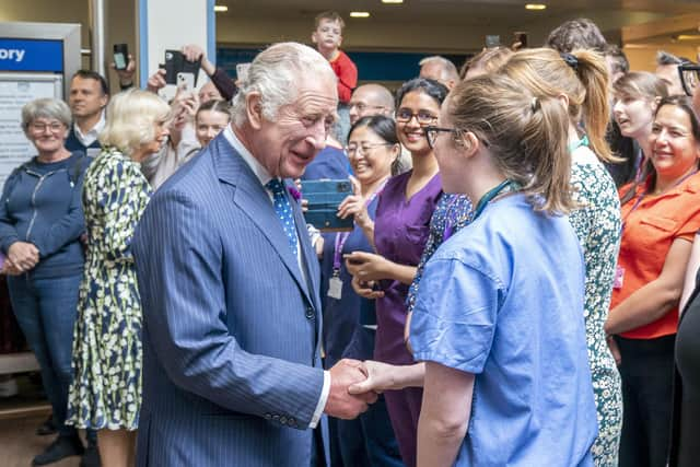 King Charles III meets staff and patients as he visits NHS Lothian's Medicine of the Elderly Meaningful Activity Centre at the Royal Infirmary of Edinburgh, to celebrate 75 years of the NHS. Picture: Jane Barlow - WPA Pool/Getty Images