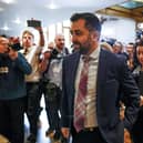 Humza Yousaf walks past gathered media following First Minister's Questions at the Scottish Parliament, where he was quizzed over the resignation of health secretary Michael Matheson ahead of a report into an £11,000 bill that was racked up on his parliamentary iPad (Picture: Jeff J Mitchell/Getty Images)