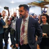Humza Yousaf walks past gathered media following First Minister's Questions at the Scottish Parliament, where he was quizzed over the resignation of health secretary Michael Matheson ahead of a report into an £11,000 bill that was racked up on his parliamentary iPad (Picture: Jeff J Mitchell/Getty Images)
