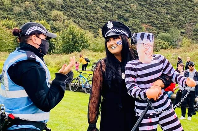 An activist taking part in the anti-mask and anti-lockdown protests in Holyrood Park on Saturday, 10 October. Picture: JPI Media/Lisa Ferguson