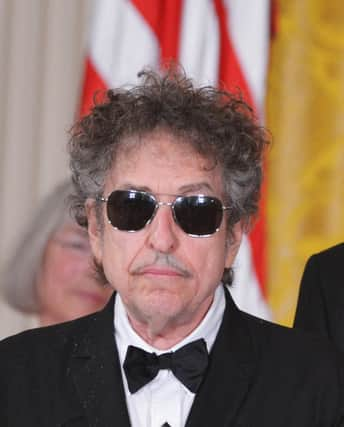 Who is Bob Dylan and how old is he? Here's what you need to know about the American songwriter accused of sexual assault. (Photo by Mandel Ngan/AFP via Getty Images)