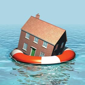 House on a lifebelt, housing market in trouble, rising sea levels