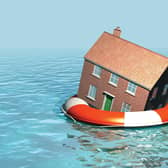 House on a lifebelt, housing market in trouble, rising sea levels