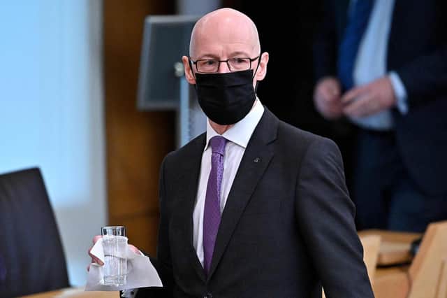 Deputy First Minister John Swinney survived a vote of no-confidence with backing from SNP and Scottish Green MSPs (Picture: Jeff J Mitchell/pool/AFP via Getty Images)