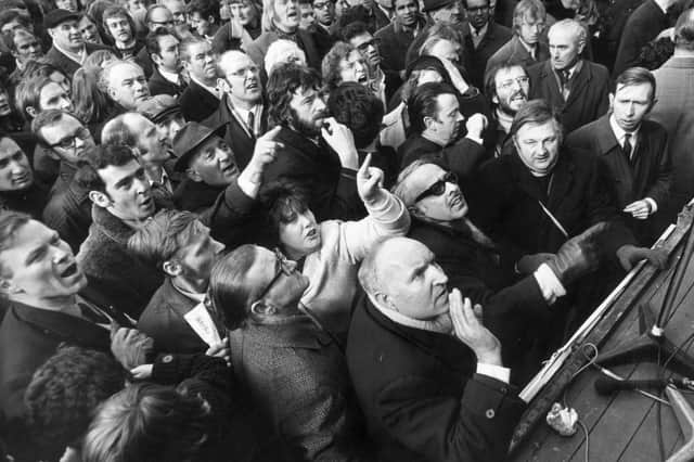 A predominantly male crowd of postal workers heckle union leaders after they recommended a return to work during a strike in 1971 (Picture: Roger Jackson/Central Press/Getty Images)