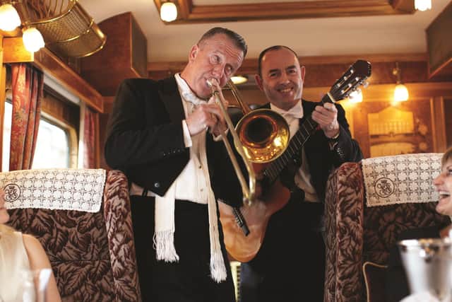 The right note ... musicians serenade passengers on the Northern Belle