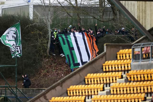 A group of Celtic fans watched their match with St Johnstone from outside McDiarmid Park. (Photo by Rob Casey / SNS Group)