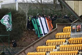 A group of Celtic fans watched their match with St Johnstone from outside McDiarmid Park. (Photo by Rob Casey / SNS Group)