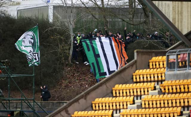 A group of Celtic fans watched their match with St Johnstone from outside McDiarmid Park. (Photo by Rob Casey / SNS Group)