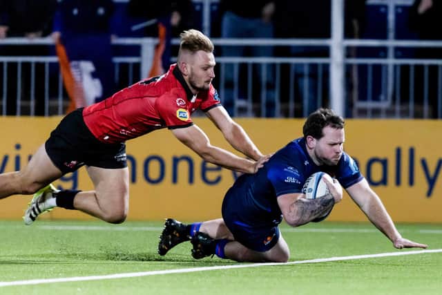 Edinburgh's Ewan Ashman scores a try on his debut against Emirates Lions at the Hive.