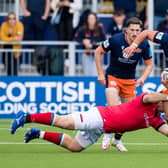 Charlie Savala tries to spark an attack for Edinburgh in the pre-season match against Newcastle Falcons. Picture: Ross Parker/SNS