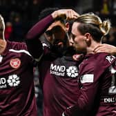 Hearts' Josh Ginnelly points to Barrie McKay after making it 2-0 againt St Johnstone. (Photo by Rob Casey / SNS Group)