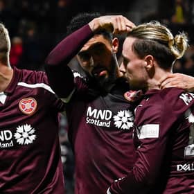 Hearts' Josh Ginnelly points to Barrie McKay after making it 2-0 againt St Johnstone. (Photo by Rob Casey / SNS Group)