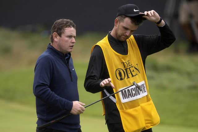 Bob MacIntyre and caddie Greg Milne at the end of the fourth round at Royal Liverpool. Picture: Tom Russo/The Scotsman.