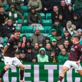 Luke McCowan slots home his first goal for Celtic to secure all three points against Hearts (Photo by Ross MacDonald / SNS Group)