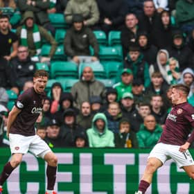 Luke McCowan slots home his first goal for Celtic to secure all three points against Hearts (Photo by Ross MacDonald / SNS Group)