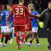 Aberdeen manager Barry Robson and Slobodan Rubezic at full time following the 1-1 draw against Rangers.