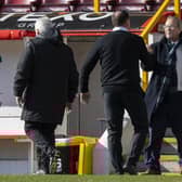 Ross County chairman Roy MacGregor celebrates with his manager Malky Mackay.