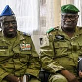 Niger's National Council for Safeguard of the Homeland (CNSP) members General Mohamed Toumba (R) and Colonel Abdramane Amadou (L)  in Nigerien capital Niamey this week.