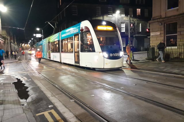 The test tram at the Queen Charlotte Street / Constitution Street junction.