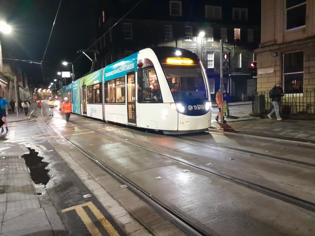 The test tram at the Queen Charlotte Street / Constitution Street junction.