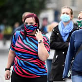 Scotland has scrapped the legal requirement to wear face coverings in public settings from today onwards (Photo by Jeff J Mitchell/Getty Images).