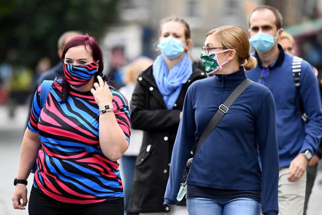 Scotland has scrapped the legal requirement to wear face coverings in public settings from today onwards (Photo by Jeff J Mitchell/Getty Images).
