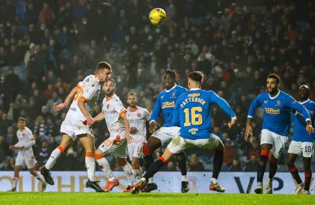Darren Watson comes close to a dramatic late equaliser for Dundee United at Ibrox with this header which struck the crossbar. (Photo by Alan Harvey / SNS Group)