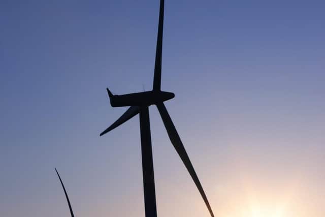 Wind turbines near Glasgow. (Photo by Martin McCarthy/Getty Images/iStockphoto)