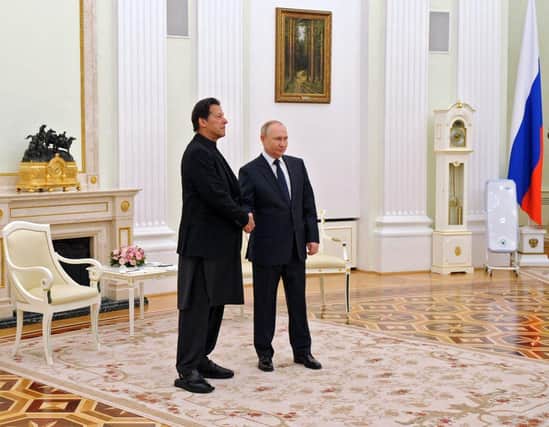 Russian President Vladimir Putin meets with Pakistan's Prime Minister Imran Khan at the Kremlin in Moscow on 24 February this year