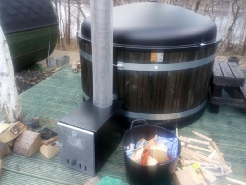 There's always plenty of freshly-chopped wood available to fire up your personal hot tub.