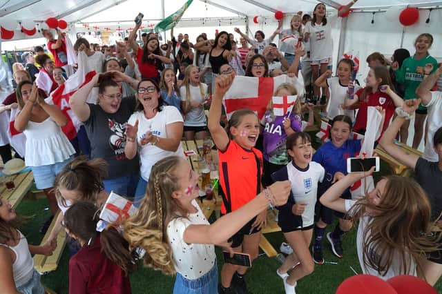 Fans at Aylesbury United WFC celebrate England's victory in the Uefa Women's Euro 2022 final (Picture: Steve Parson/PA)