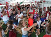 Fans at Aylesbury United WFC celebrate England's victory in the Uefa Women's Euro 2022 final (Picture: Steve Parson/PA)