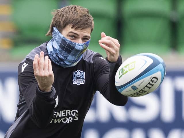 Glasgow Warriors wing Sebastian Cancelliere dons a tartan snood during a training session at Scotstoun. (Photo by Ross MacDonald / SNS Group)