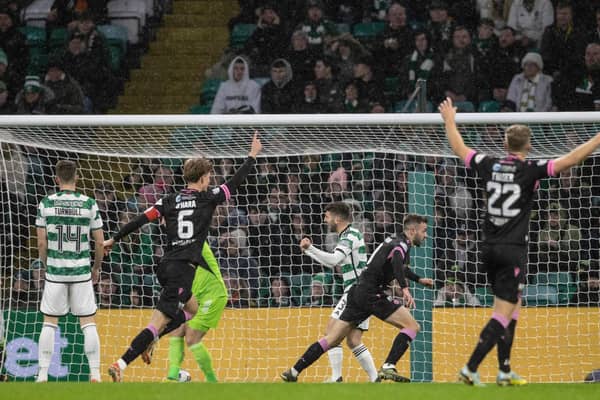 Conor McMenamin celebrates after heading St Mirren into a 1-0 at Celtic Park. (Photo by Alan Harvey / SNS Group)