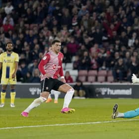Southampton's Che Adams puts the ball past Preston North End goalkeeper Freddie Woodman to score his second goal of the game in Tuesday's 3-0 win at St Mary's.