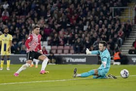 Southampton's Che Adams puts the ball past Preston North End goalkeeper Freddie Woodman to score his second goal of the game in Tuesday's 3-0 win at St Mary's.