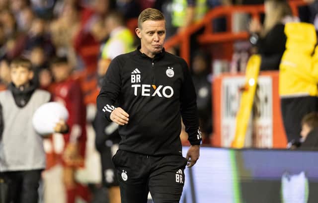 Aberdeen manager Barry Robson looks on at full time following the defeat by BK Hacken.