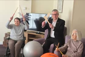 Stuart McMillan, Member of Scottish Parliament (MSP) for Greenock and Inverclyde with residents at HC-One Scotland’s Merino Court Care Home celebrating Care Home Open Week 2025