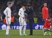 England manager Gareth Southgate consoles Jadon Sancho after defeat in the penalty shootout that decided the Euro 2020 final (Picture: Laurence Griffiths/pool via AP)