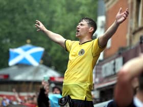 Scotland fans gather in Leicester Square before the UEFA Euro 2020 match between England and Scotland later tonight.