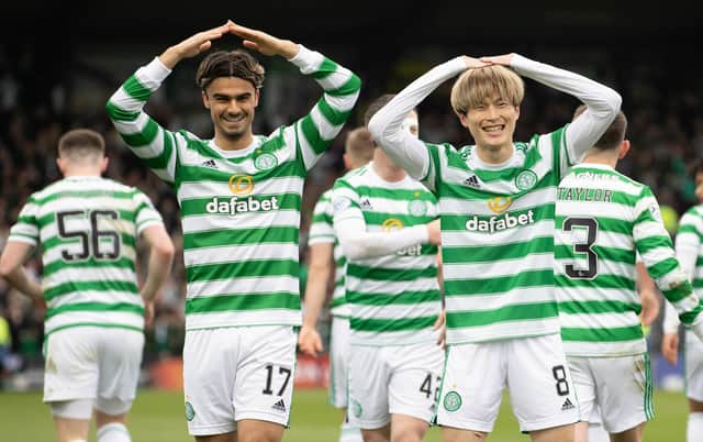 Kyogo Furuhashi (right) celebrates with Jota after scoring Celtic's opener in the win over Ross County. (Photo by Alan Harvey / SNS Group)