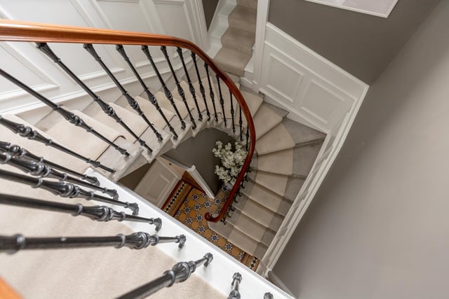 The stairs lead to a galleried landing