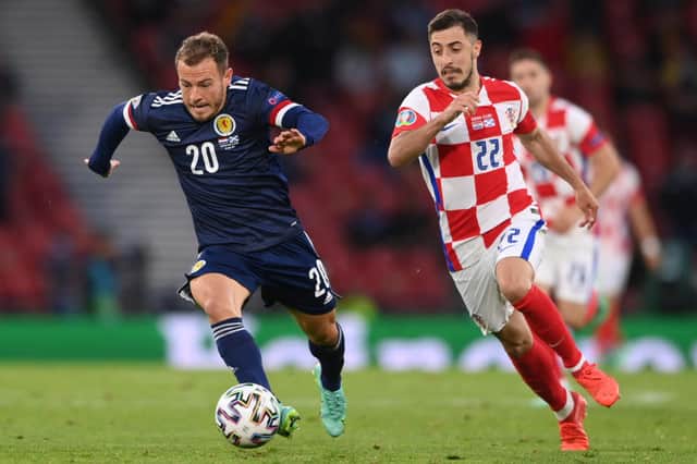 Croatia right-bac Josip Juranovic chases Scotland's Ryan Fraser during the UEFA EURO 2020 (Photo by STU FORSTER/POOL/AFP via Getty Images)